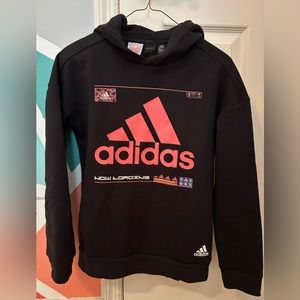 Adidas kids hoodie. Black with pink logo and detailing.